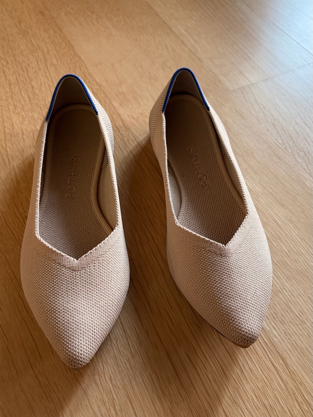 Rothy's Pointed Knit Flats in Beige with Navy Heel Trim